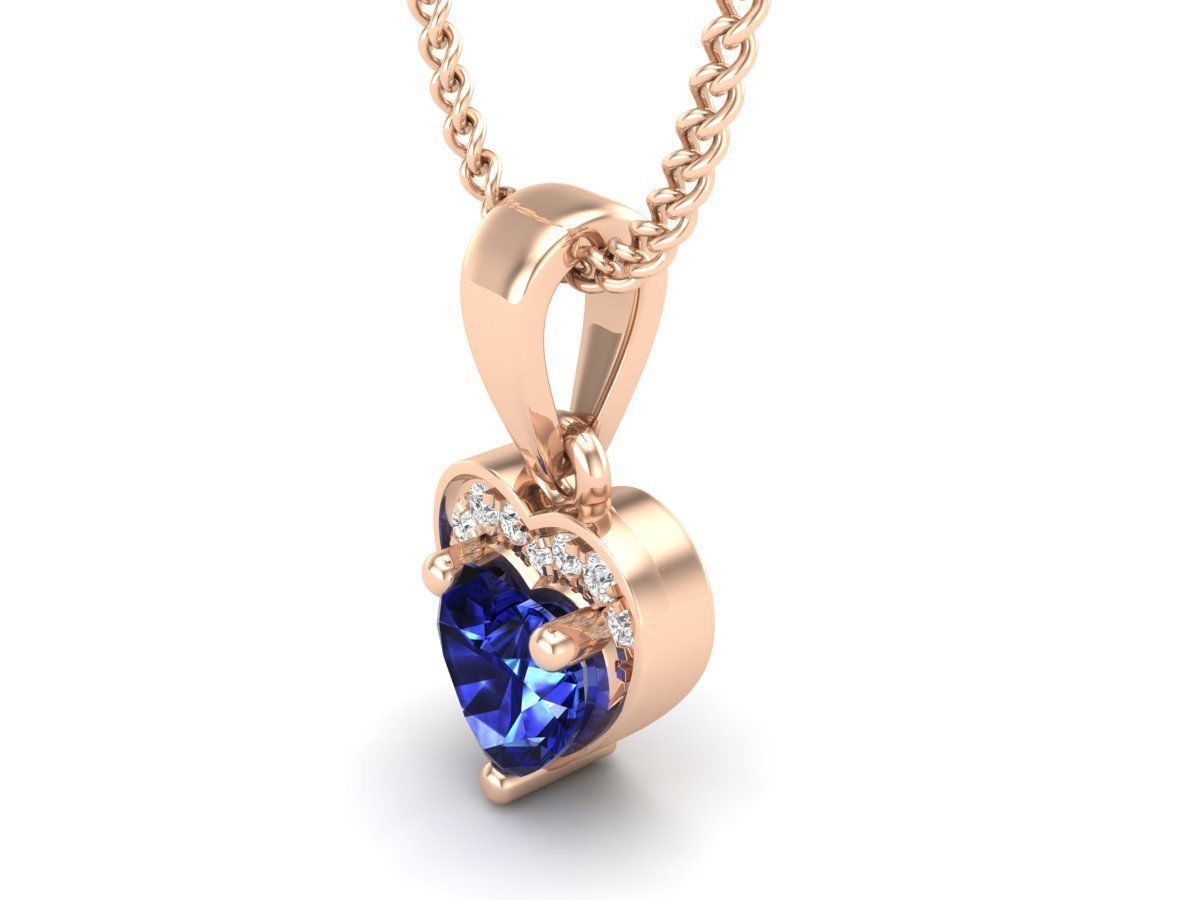 Elegant Sapphire Heart Necklace with a sparkling blue heart-shaped pendant in sterling silver.