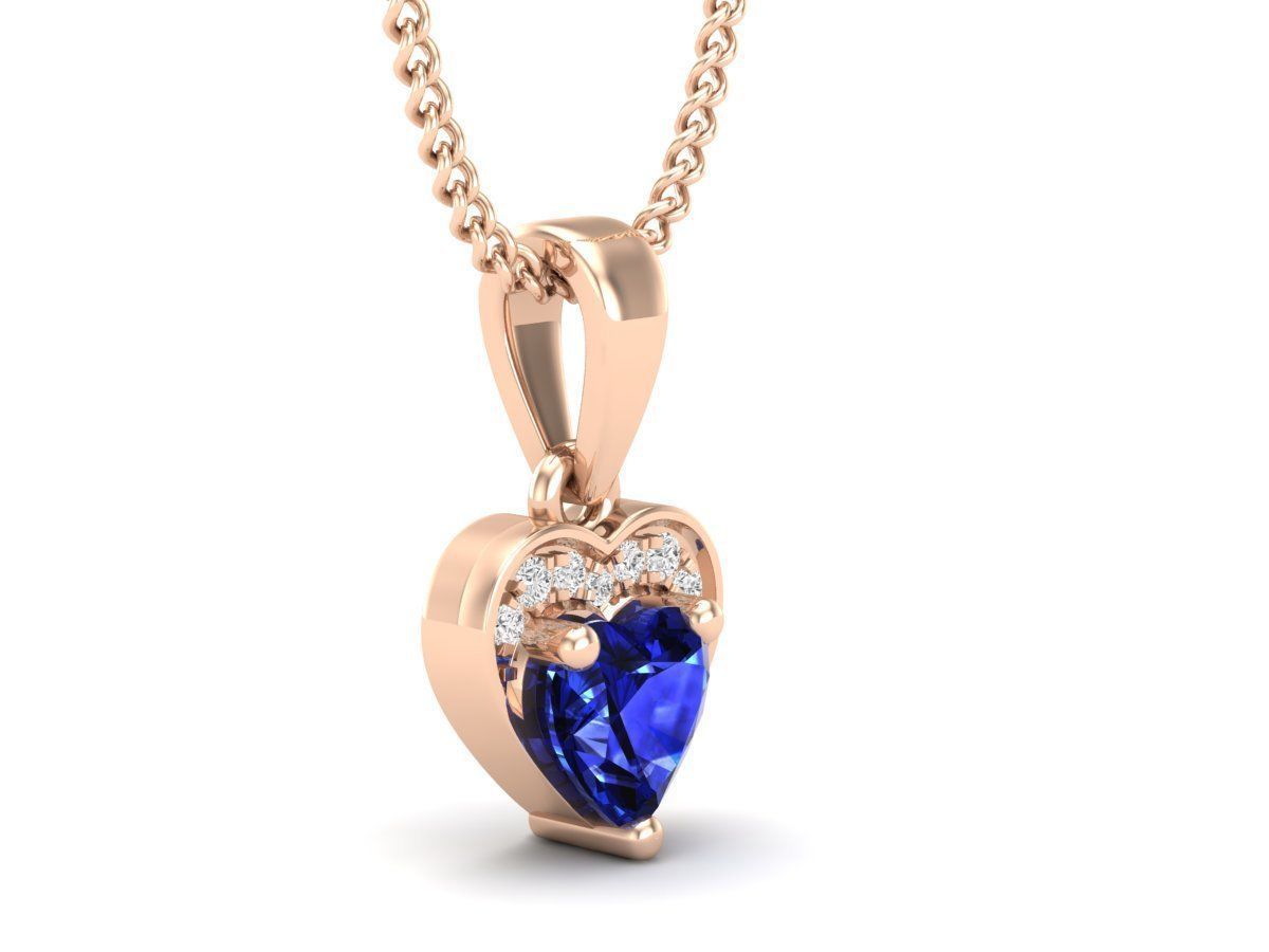 Elegant Sapphire Heart Necklace with a sparkling blue heart-shaped pendant in sterling silver.
