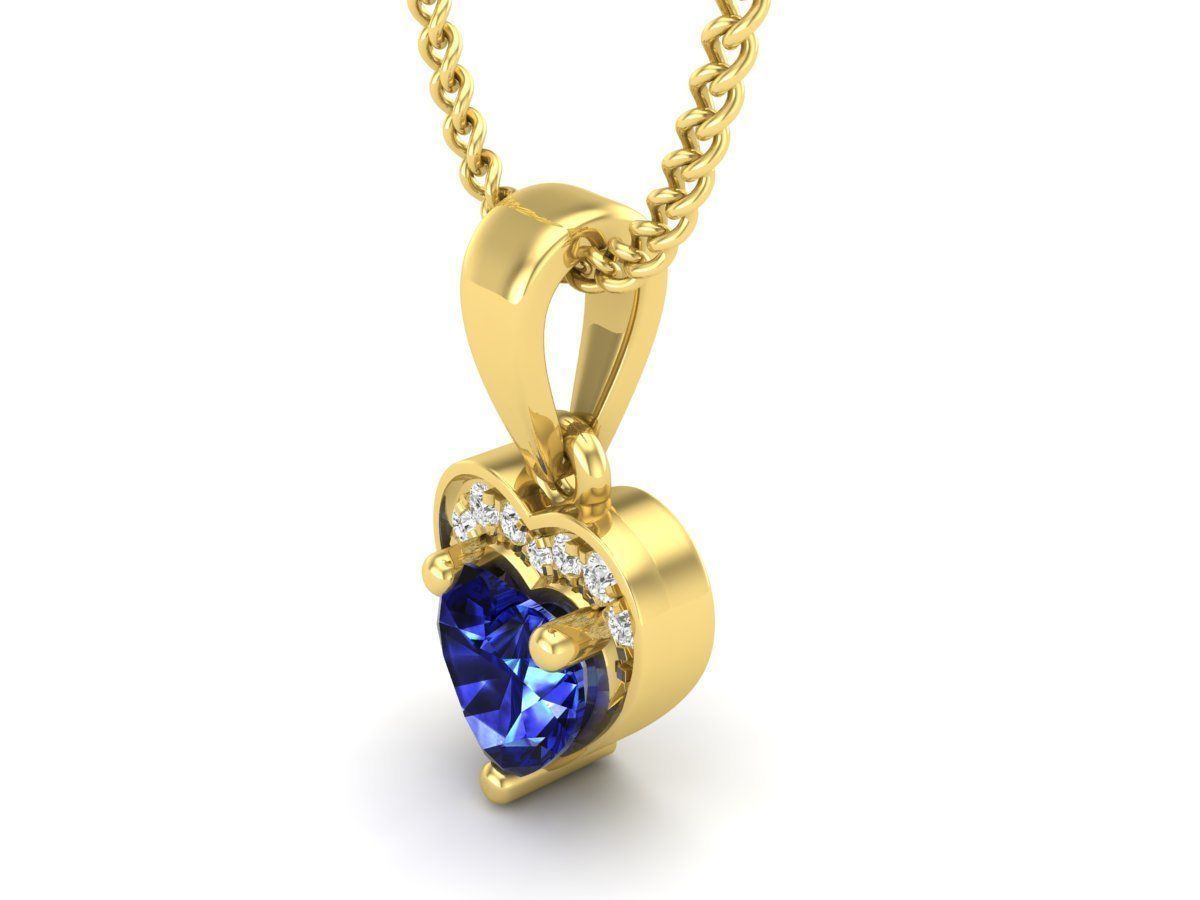 Elegant Sapphire Heart Necklace with a sparkling blue heart-shaped pendant in sterling silver.