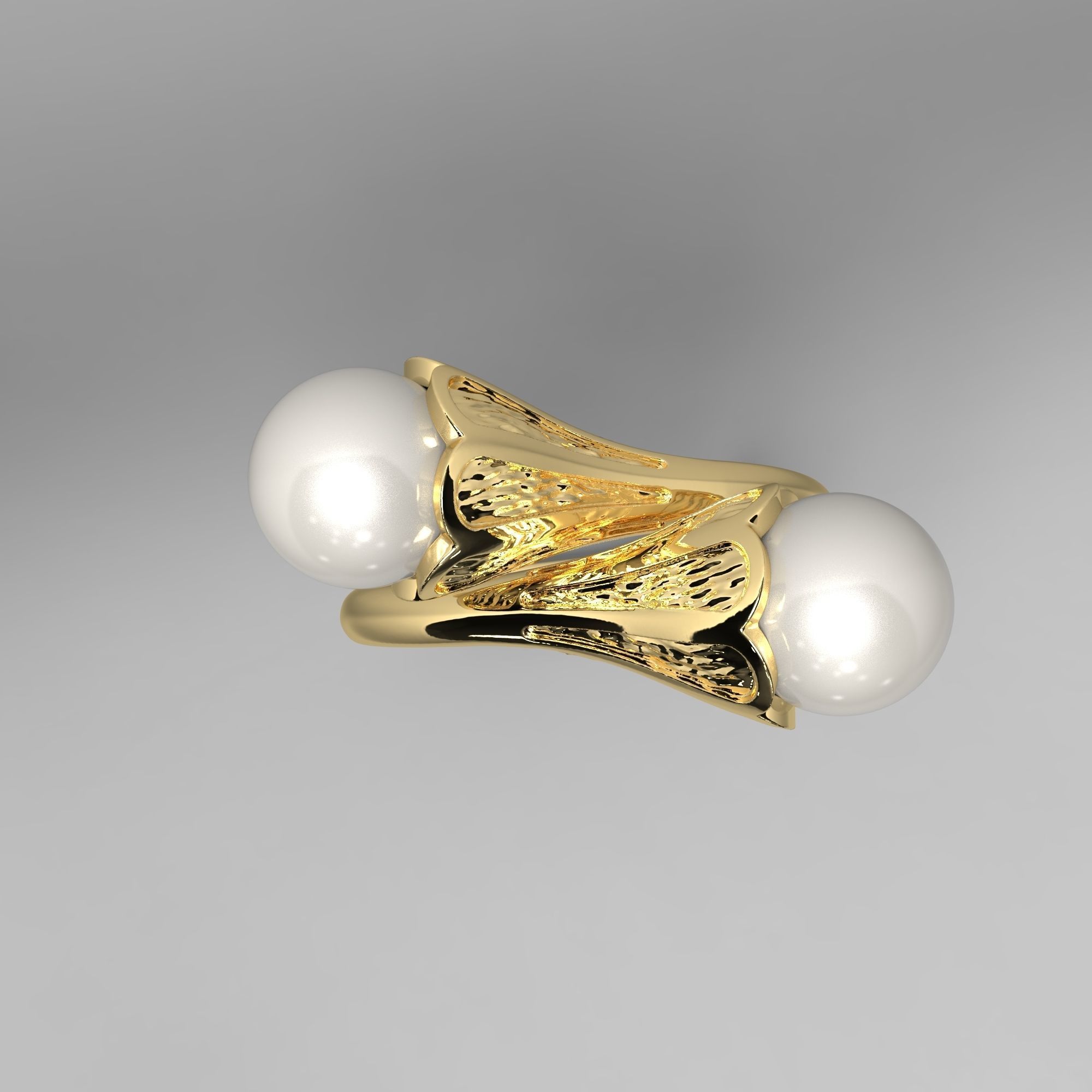 A sophisticated silver ring with two cross-set pearls and intricate detailing.