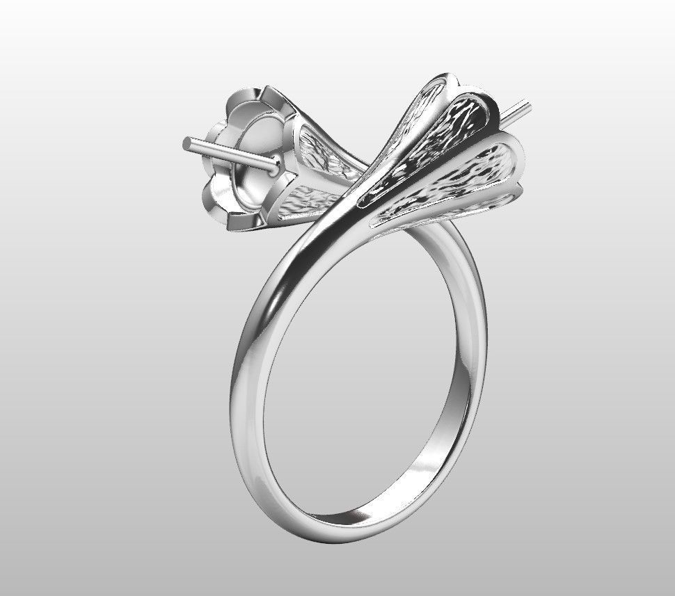 A sophisticated silver ring with two cross-set pearls and intricate detailing.