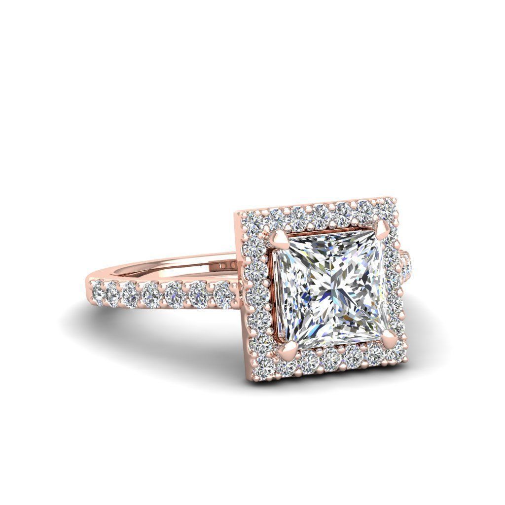 A stunning Silver 925 ring featuring a princess cut stone surrounded by a radiant halo.
