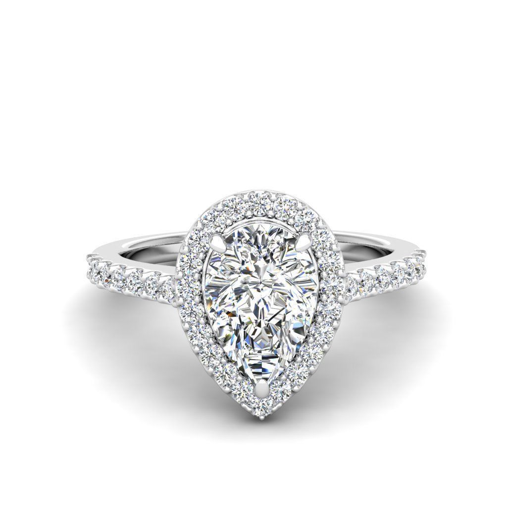 HFS-R064 (10) A stunning Silver 925 ring featuring a pear-shaped cut stone surrounded by a radiant halo.