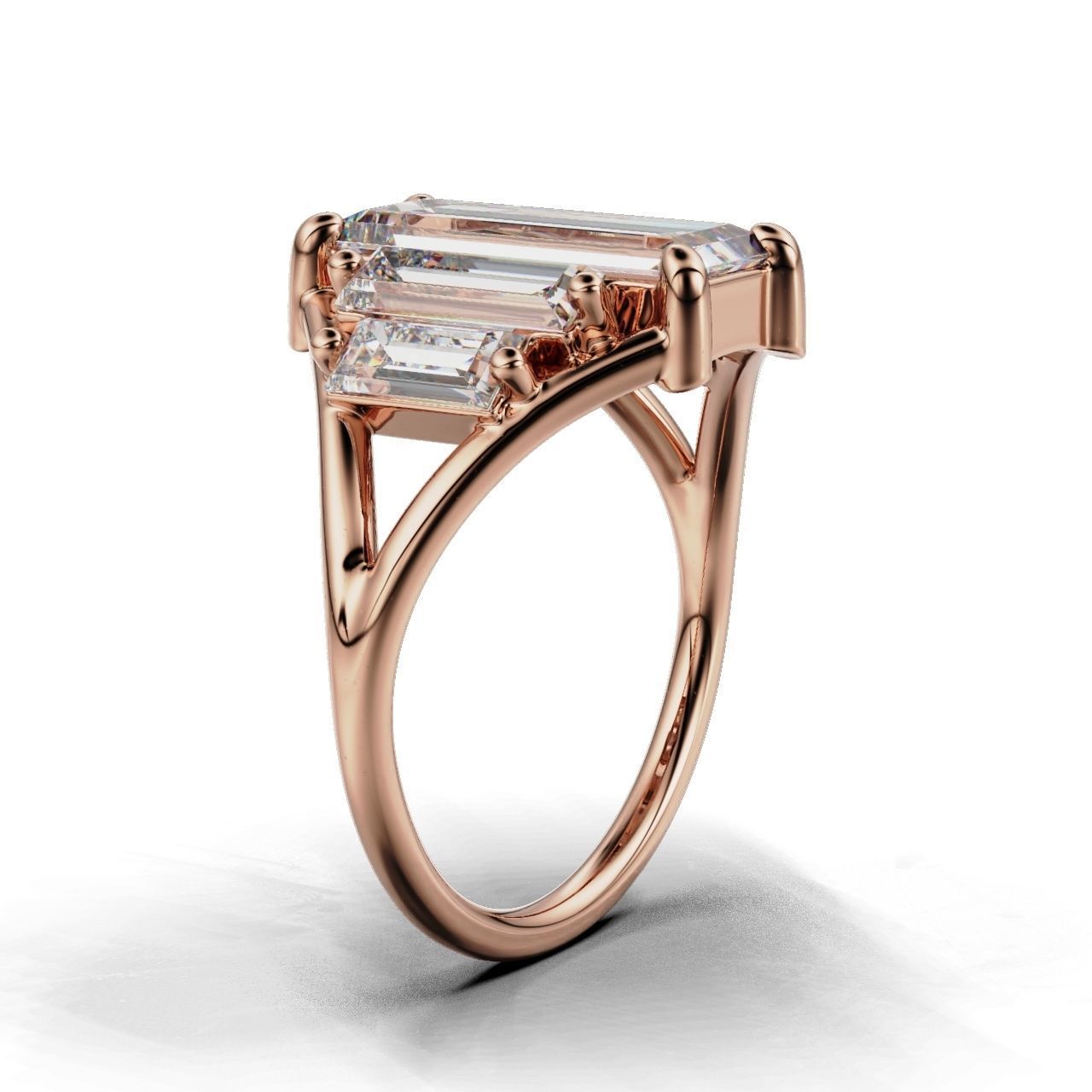 Modern Baguette Silver Ring with an emerald-cut central stone flanked by smaller rectangular stones on a sleek silver ring.