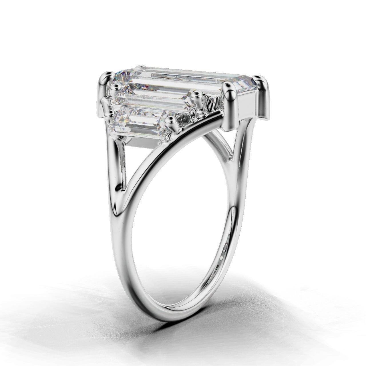 Modern Baguette Silver Ring with an emerald-cut central stone flanked by smaller rectangular stones on a sleek silver ring.