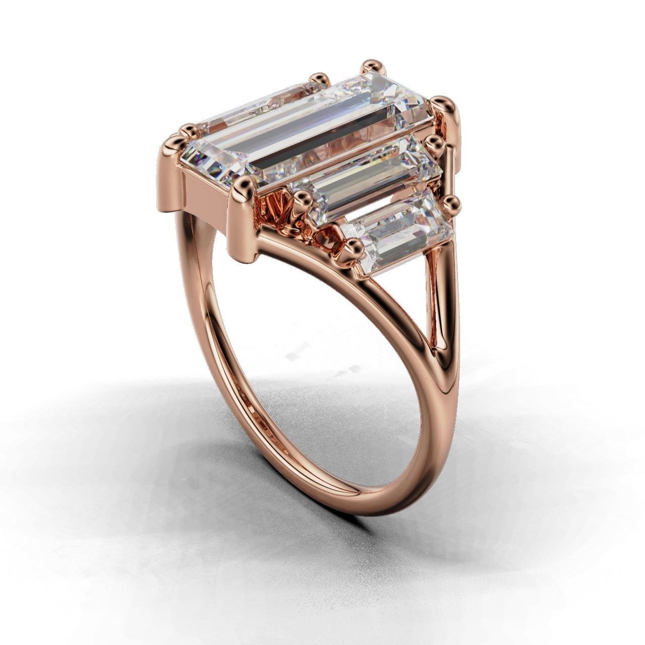 Modern Baguette Silver Ring with an emerald-cut central stone flanked by smaller rectangular stones on a sleek silver ring.