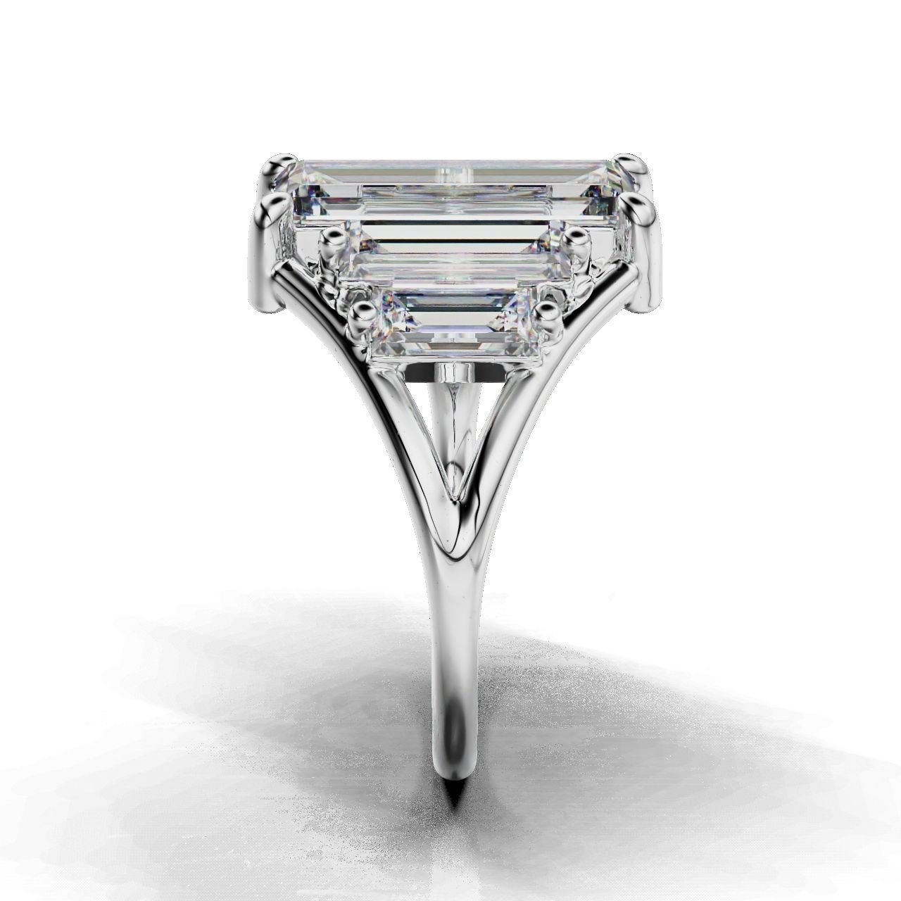 Modern Baguette Silver Ring with an emerald-cut central stone flanked by smaller rectangular stones on a sleek silver ring.