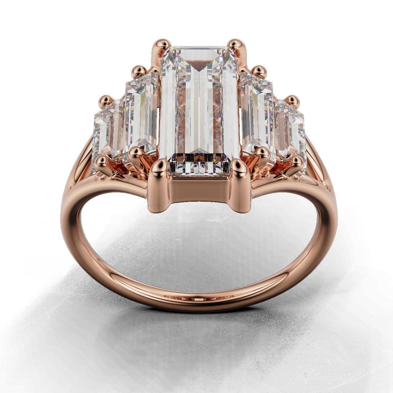 Modern Baguette Silver Ring with an emerald-cut central stone flanked by smaller rectangular stones on a sleek silver ring.