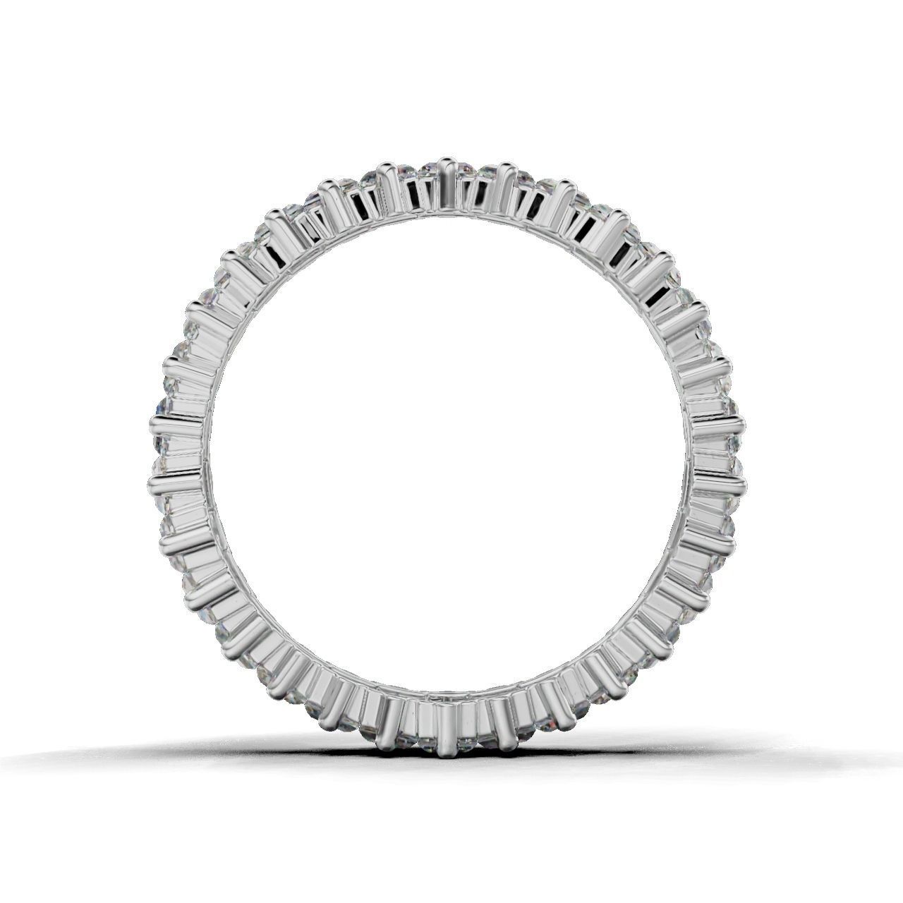 Elegant silver ring with baguette-cut stones in a continuous band.