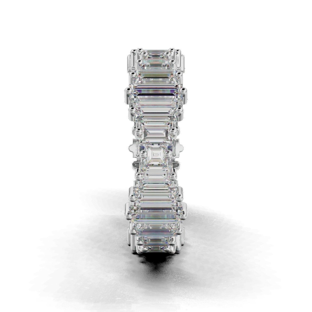 Elegant silver ring with baguette-cut stones in a continuous band.