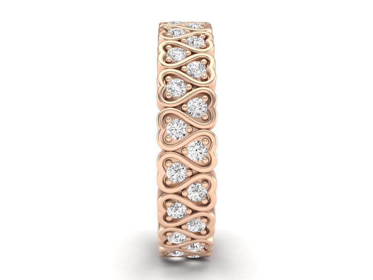 Sterling silver ring with intricate heart designs and continuous sparkling stones, crafted in Turkey.