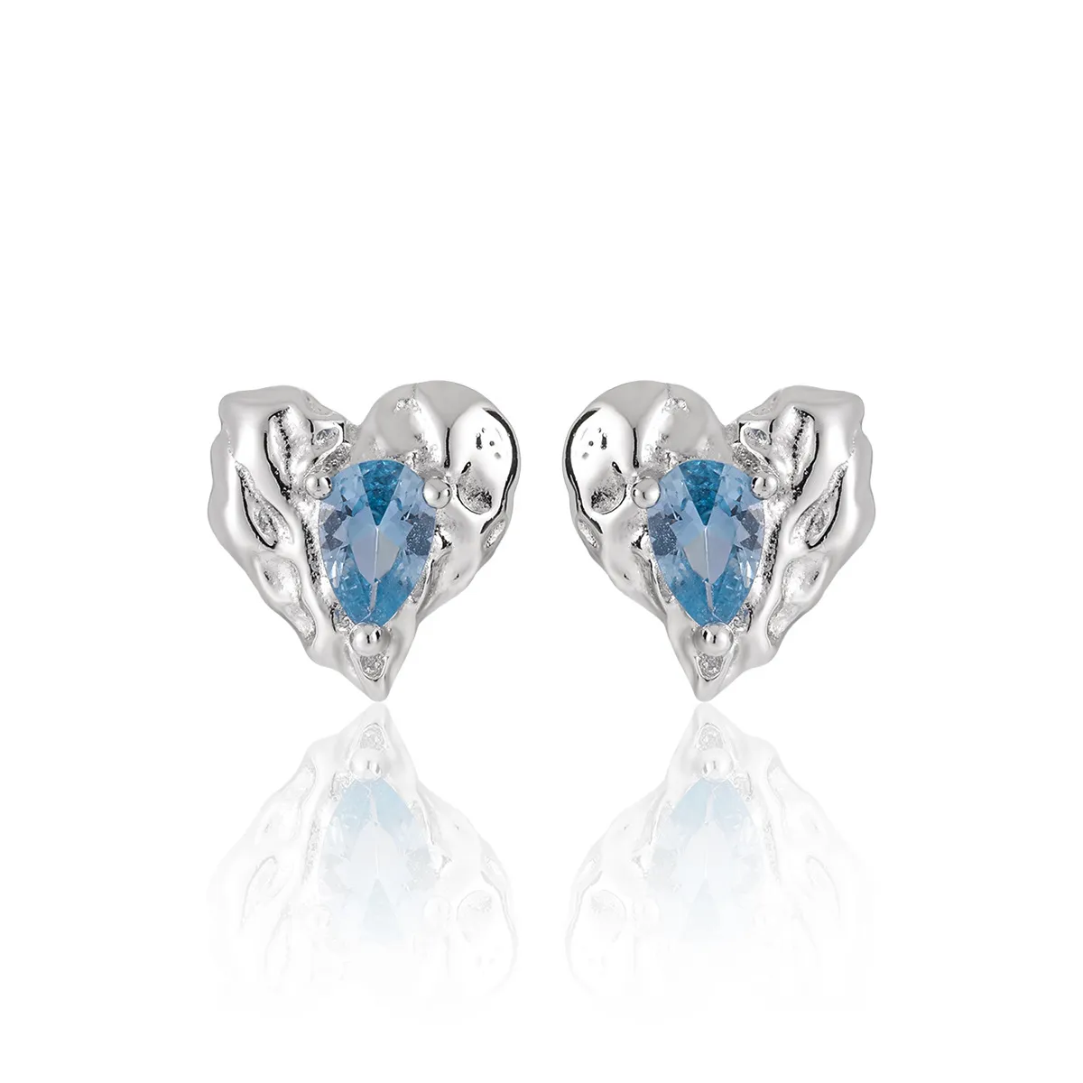 Heart-shaped silver stud earrings with sparkling zircon stones.